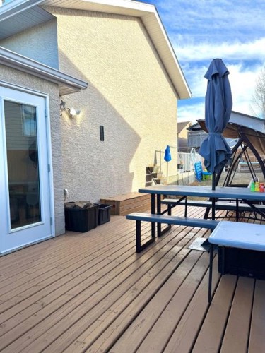 668 Blackfoot Terrace West, Lethbridge, AB - Outdoor With Deck Patio Veranda With Exterior