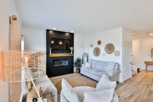 174 Caribou Bend North, Lethbridge, AB - Indoor Photo Showing Living Room With Fireplace