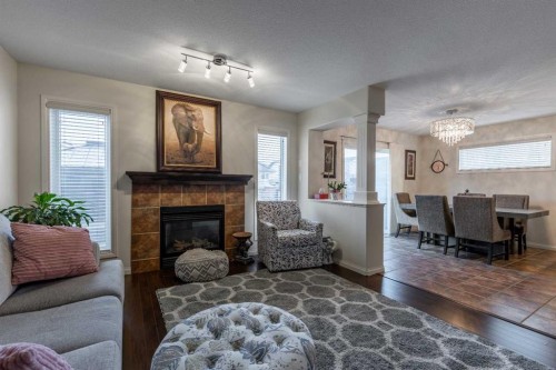 420 Silkstone Crescent West, Lethbridge, AB - Indoor Photo Showing Living Room With Fireplace