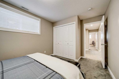 1961 Parkside Way, Coaldale, AB - Indoor Photo Showing Bedroom