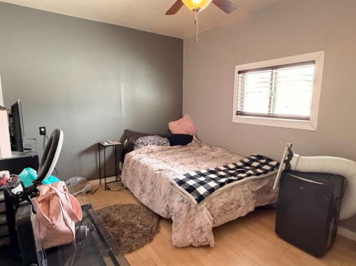 6119 53 Street, Taber, AB - Indoor Photo Showing Bedroom