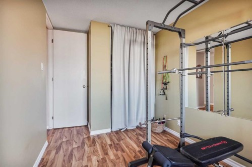 98 Eagle Road North, Lethbridge, AB - Indoor Photo Showing Gym Room