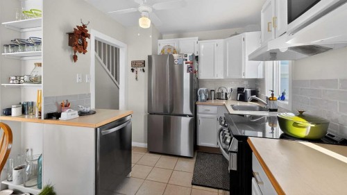 11 Mountain Vista Drive, Hill Spring, AB - Indoor Photo Showing Kitchen With Stainless Steel Kitchen