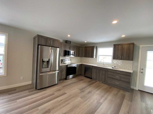 4229 57 Street, Taber, AB - Indoor Photo Showing Kitchen With Stainless Steel Kitchen