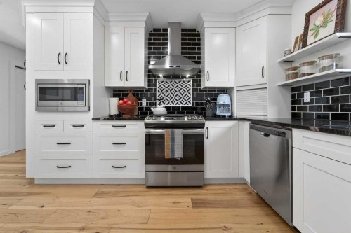 39 Wildwood Crescent West, Lethbridge, AB - Indoor Photo Showing Kitchen With Stainless Steel Kitchen With Upgraded Kitchen