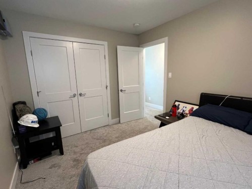 642 Moonlight Lane West, Lethbridge, AB - Indoor Photo Showing Bedroom