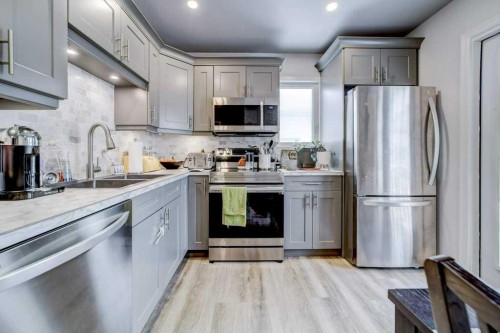 1112 17 Street South, Lethbridge, AB - Indoor Photo Showing Kitchen With Double Sink With Upgraded Kitchen
