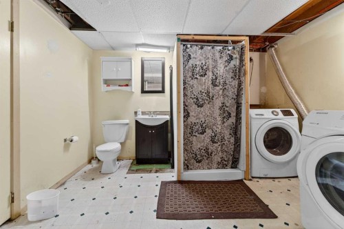 7705 24 Avenue, Coleman, AB - Indoor Photo Showing Laundry Room