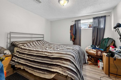7705 24 Avenue, Coleman, AB - Indoor Photo Showing Bedroom