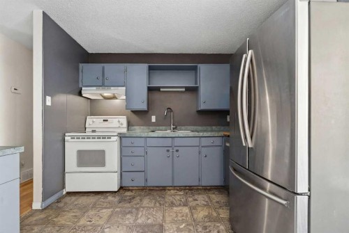 7705 24 Avenue, Coleman, AB - Indoor Photo Showing Kitchen