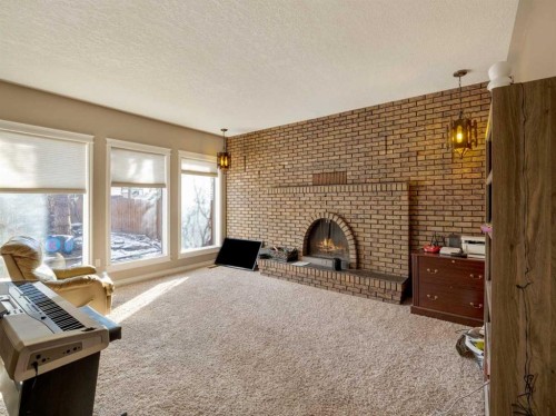 51 Tudor Boulevard South, Lethbridge, AB - Indoor With Fireplace