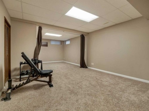 51 Tudor Boulevard South, Lethbridge, AB - Indoor Photo Showing Gym Room
