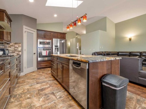 128 Sixmile Common South, Lethbridge, AB - Indoor Photo Showing Kitchen With Upgraded Kitchen