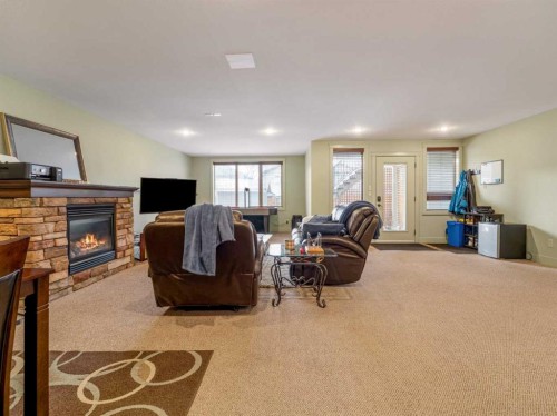 128 Sixmile Common South, Lethbridge, AB - Indoor With Fireplace