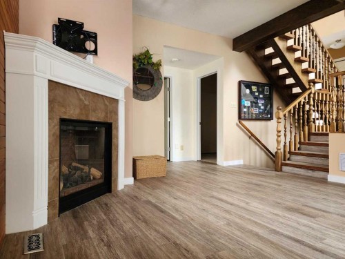 15 Elm Crescent South, Lethbridge, AB - Indoor With Fireplace