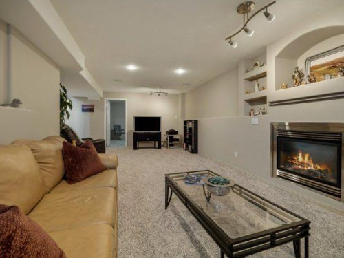 76 Grand River Boulevard West, Lethbridge, AB - Indoor Photo Showing Other Room With Fireplace