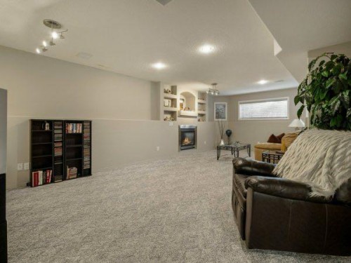 76 Grand River Boulevard West, Lethbridge, AB - Indoor With Fireplace