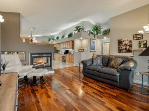 76 Grand River Boulevard West, Lethbridge, AB - Indoor Photo Showing Living Room With Fireplace