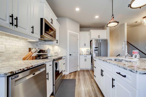 1029 Livingston Way, Pincher Creek, AB - Indoor Photo Showing Kitchen With Double Sink With Upgraded Kitchen