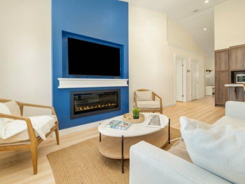 721 7 Avenue West, Cardston, AB - Indoor Photo Showing Living Room With Fireplace