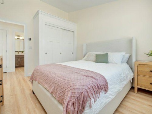 721 7 Avenue West, Cardston, AB - Indoor Photo Showing Bedroom
