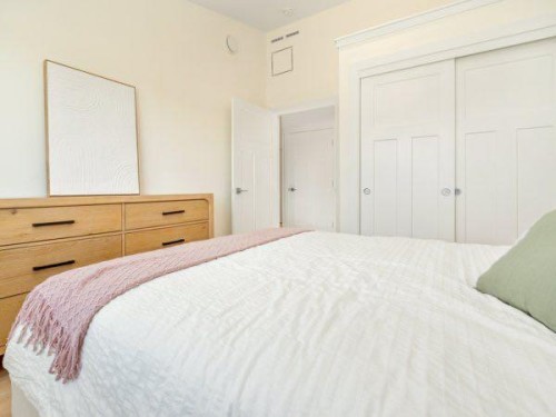 721 7 Avenue West, Cardston, AB - Indoor Photo Showing Bedroom