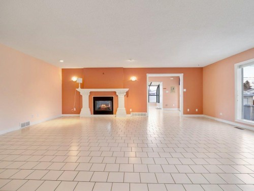 2123 10 Avenue South, Lethbridge, AB - Indoor Photo Showing Living Room With Fireplace