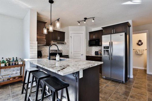 437 Twinriver Road West, Lethbridge, AB - Indoor Photo Showing Kitchen With Stainless Steel Kitchen With Upgraded Kitchen