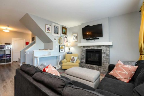 502 Bluebell Lane West, Lethbridge, AB - Indoor Photo Showing Living Room With Fireplace