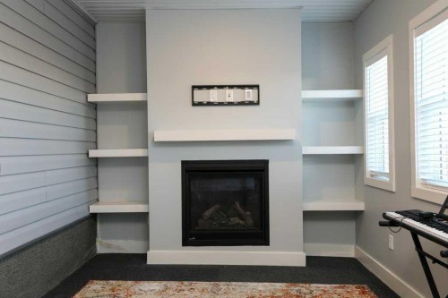 502 Bluebell Lane West, Lethbridge, AB - Indoor With Fireplace