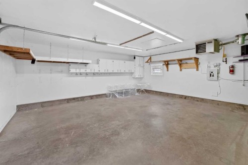 95 Stoney Crescent West, Lethbridge, AB - Indoor Photo Showing Garage