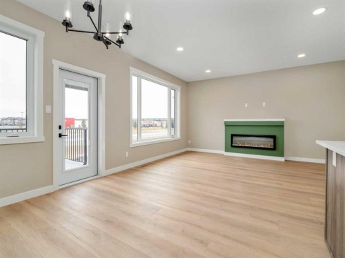 409 Rivergrove Chase West, Lethbridge, AB - Indoor Photo Showing Living Room With Fireplace
