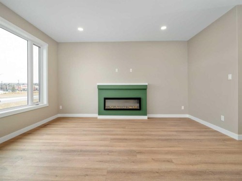 409 Rivergrove Chase West, Lethbridge, AB - Indoor With Fireplace
