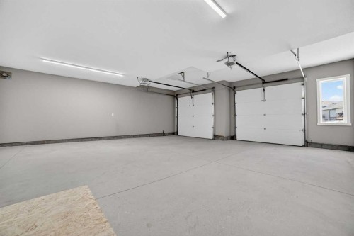 409 Rivergrove Chase West, Lethbridge, AB - Indoor Photo Showing Garage