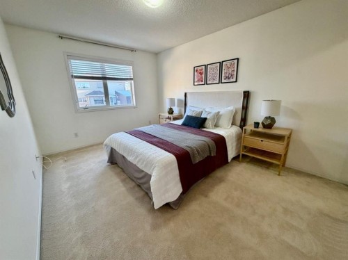 613 Squamish Lane West, Lethbridge, AB - Indoor Photo Showing Bedroom