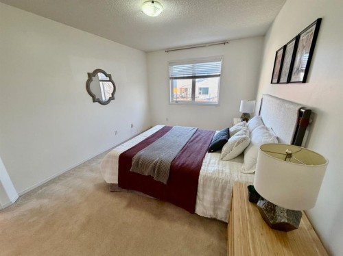 613 Squamish Lane West, Lethbridge, AB - Indoor Photo Showing Bedroom