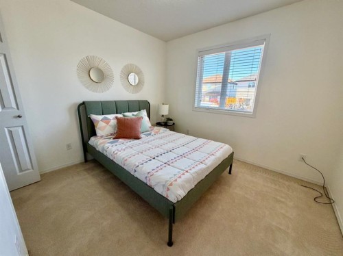 613 Squamish Lane West, Lethbridge, AB - Indoor Photo Showing Bedroom
