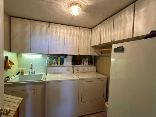 1801 82 Street, Coleman, AB - Indoor Photo Showing Laundry Room
