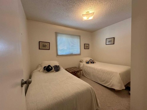 1801 82 Street, Coleman, AB - Indoor Photo Showing Bedroom