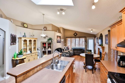 408 Thyrza Burkitt Link North, Lethbridge, AB - Indoor Photo Showing Kitchen With Double Sink