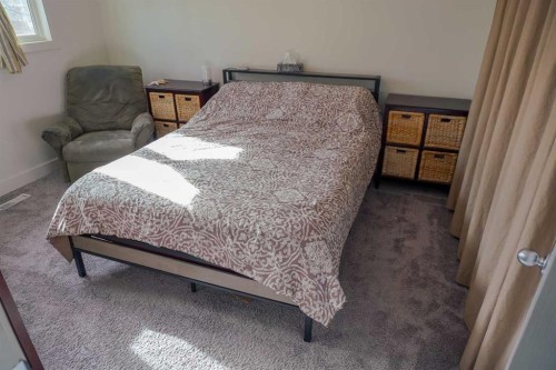 206 Mcgill Boulevard West, Lethbridge, AB - Indoor Photo Showing Bedroom