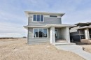 320 Aquitania Boulevard West, Lethbridge, AB  - Outdoor With Facade 
