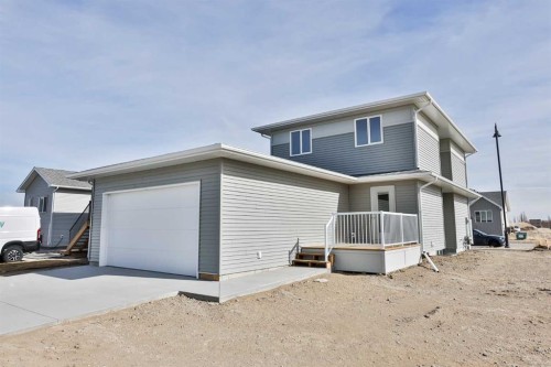 320 Aquitania Boulevard West, Lethbridge, AB - Outdoor With Exterior