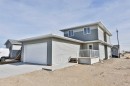 320 Aquitania Boulevard West, Lethbridge, AB  - Outdoor With Exterior 