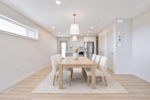 320 Aquitania Boulevard West, Lethbridge, AB - Indoor Photo Showing Dining Room