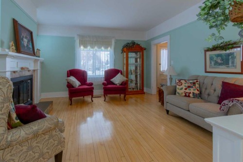 406 4 Avenue, Stirling, AB - Indoor Photo Showing Living Room With Fireplace