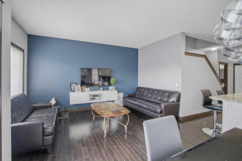 13 Evanscove Manor Nw, Calgary, AB - Indoor Photo Showing Living Room