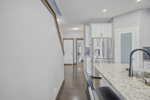 13 Evanscove Manor Nw, Calgary, AB - Indoor Photo Showing Kitchen With Upgraded Kitchen