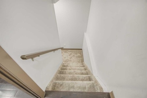 13 Evanscove Manor Nw, Calgary, AB - Indoor Photo Showing Other Room