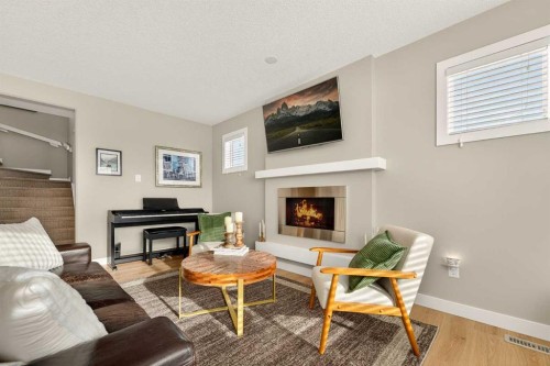148 Cabot Landing West, Lethbridge, AB - Indoor Photo Showing Living Room With Fireplace